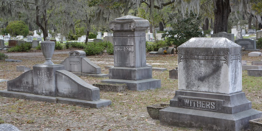 Historic cemetery with ornate statues is featured in Savannah travel guide.