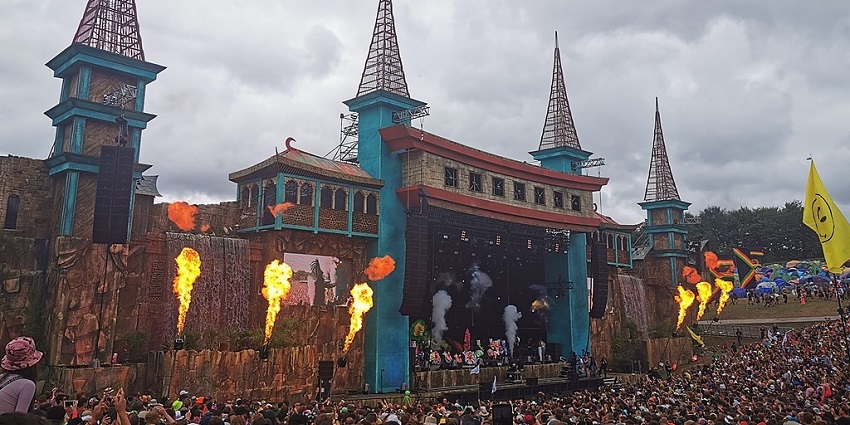 An image of people celebrating the Boomtown Fair, one of the must-visit festivals.