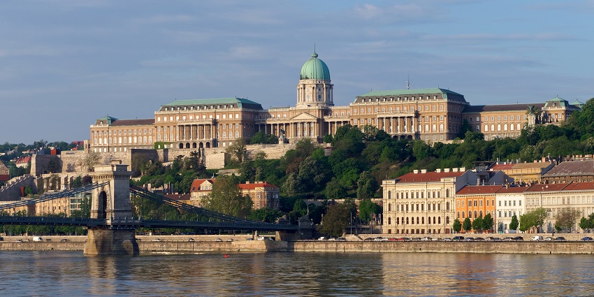 An image of a Buda Castle overlooking Budapest with romantic views of the Danube River.