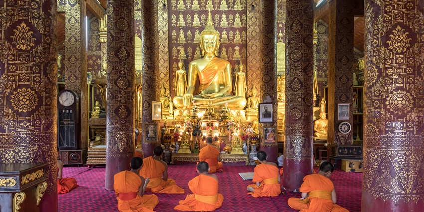 Buddhist monks in the Ganden monastery for guided tours.