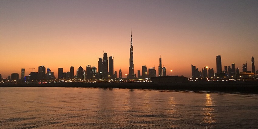 An illuminated Burj Khalifa, the tallest building in the world, as suggested by this Dubai travel guide.