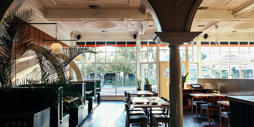 Transforming into a lively bar at night, Cafe Mercara offers a chic nightlife experience
