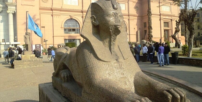 The statue in front of the entrance to the Museum of Antiquities in Cairo is located in Egypt.