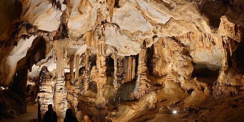 Stunning underground caves with dramatic formations, showcased in New Mexico travel guide.