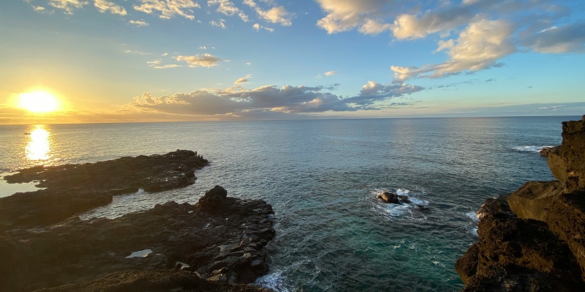 Albion Caves adjacent to the blue ocean in Mauritius is looking tranquil in the afternoon.