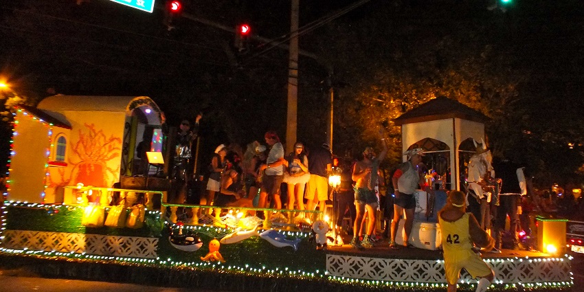 Decorations and people in different attires at the Fantasy Fest, one of the best things to do in Key West Florida in October.