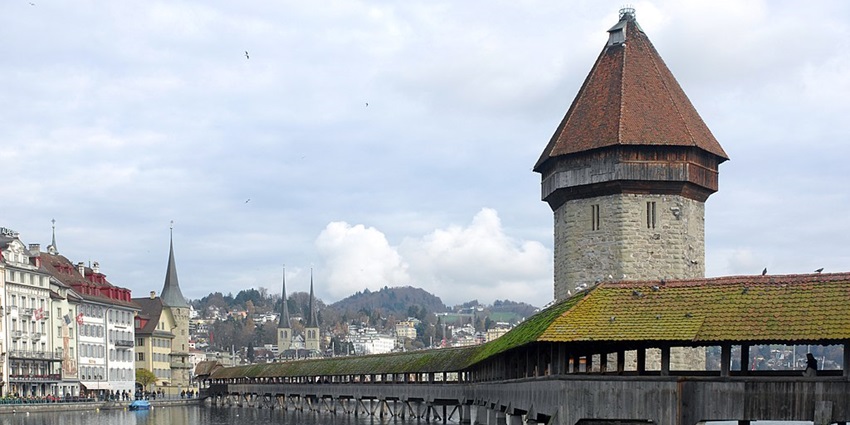 Chapel Bridge is composed of wood and has a construction style of the Middle Ages