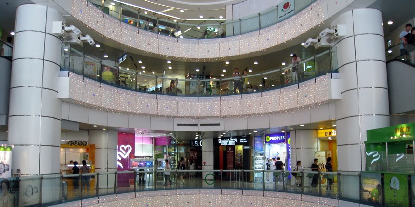 Shopping center with various stores and entertainment facilities.