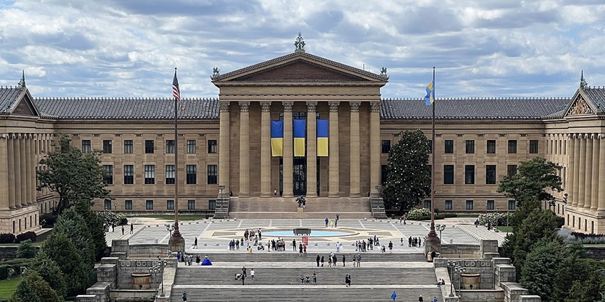 Tourists climbing the famous Rocky Steps at the Philadelphia Museum of Art.