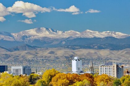 Colorado travel guide showcases mountains, scenic drives, and cities.