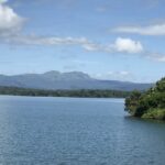 A view of serene waters at a lake in Harangi Elephant Camp and Tree Park in Coorg, Karnataka.