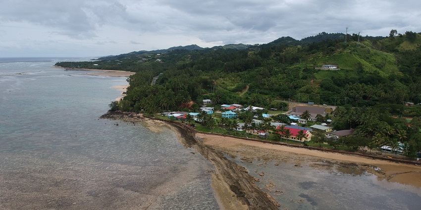 An aerial view of a village located on the Coral Coast - places to visit in Fiji