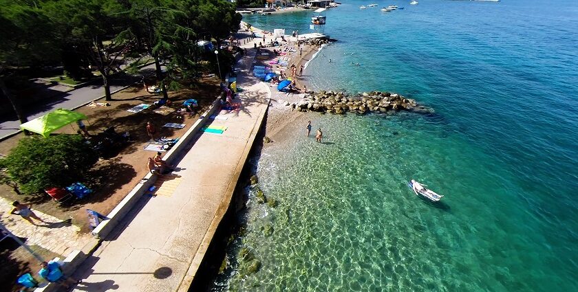 A picture of a clear turquoise sea and pebble beach, Island Krk.