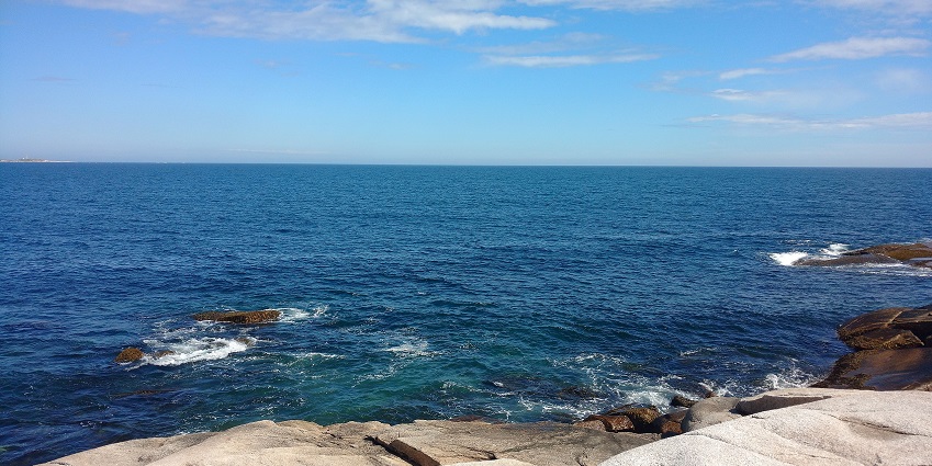 A view of the rocky shore of Crystal Crescent Beach - one of the beaches in Canada.