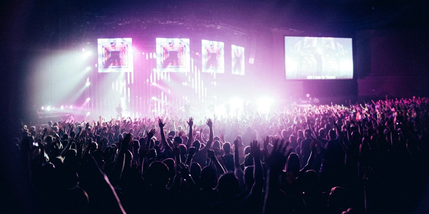 A view of festival attendants dancing to rhythms at one of the energetic stages.