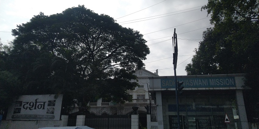 The white structure in the background is the main building of the Sadhu Vaswani Mission in Pune