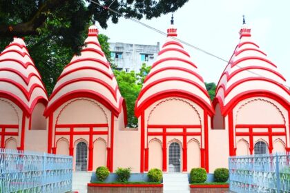 Feel serene vibes and spirituality dwelling in the environment at Dhakeshwari temple.