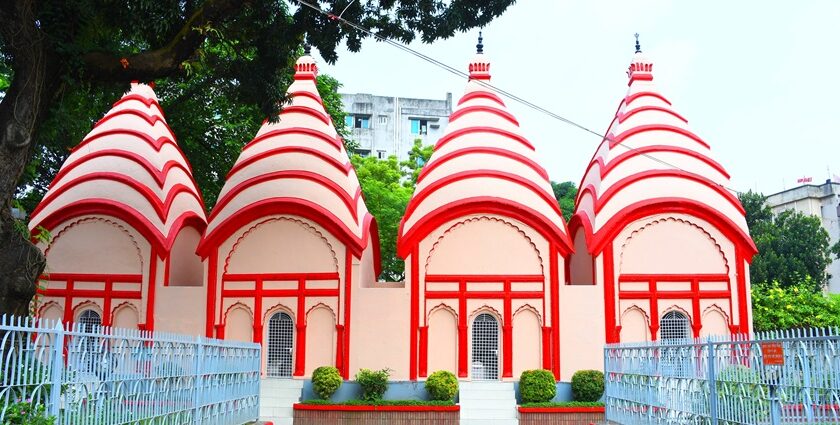 Feel serene vibes and spirituality dwelling in the environment at Dhakeshwari temple.