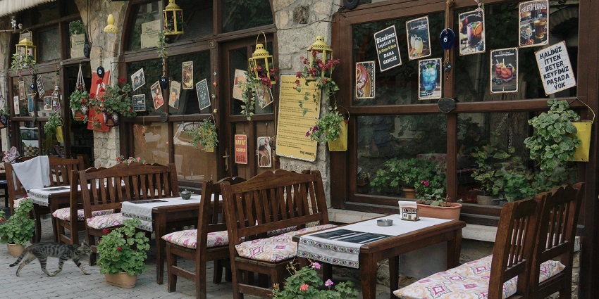 Traditional food being served at a restaurant with a cosy ambience and setting.