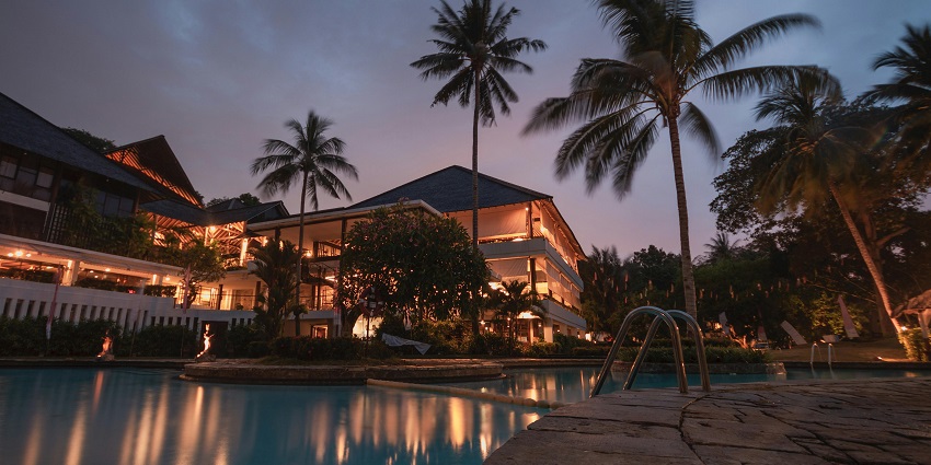 Stylish rooftop lounge with poolside ambience and views.