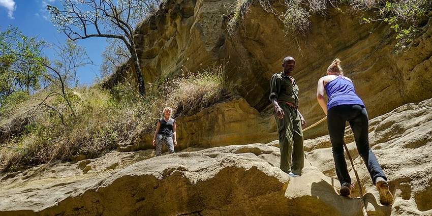 A person getting ready to do rock climbing with safety gear equipment in Hells Gate National Park.