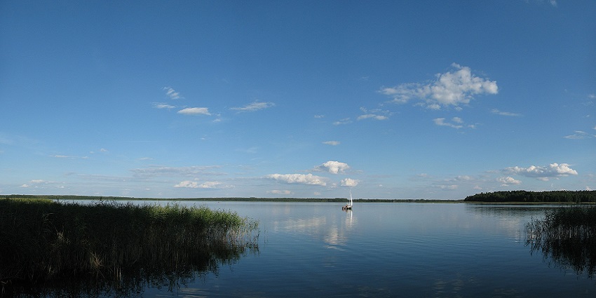 Enjoying a boat ride in Masuria is one of the most amazing things to do in Poland for all.