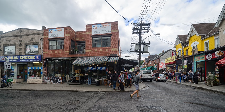 View of Kensington Market featuring its hut-shaped brick architecture, one of the best things to do in Toronto.