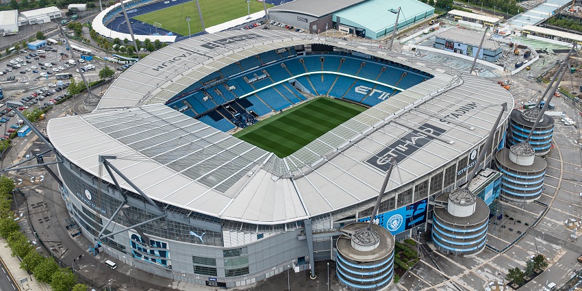An image of Etihad Stadium, one of the best places in Manchester for football fans.