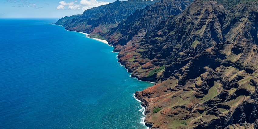 Exploring the Na Pali Coast via boat is one of the best things to do in Hawaii in May.