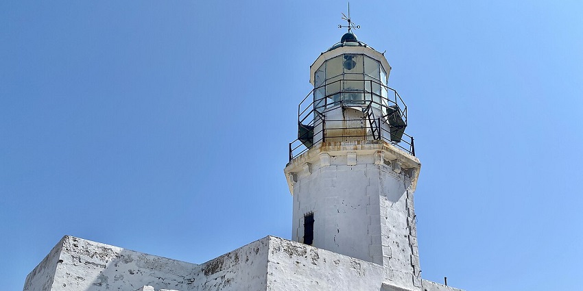 Armenistis Lighthouse on Mykonos, Greece, with panoramic Aegean Sea views—things to do in mykonos in november