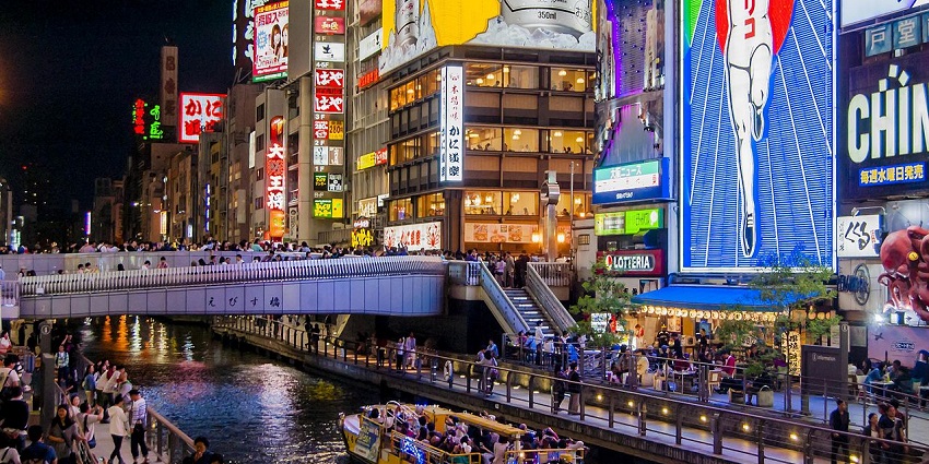 Exploring the vibrant Dotonbori district in Osaka, full of neon lights and food, is among the best things to do in Osaka.
