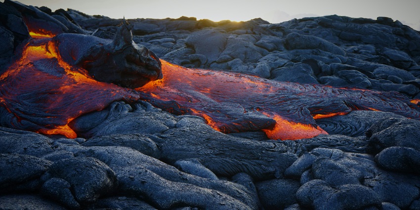 A glimpse of an active volcano oozing at the Volcanoes National Park in United States.