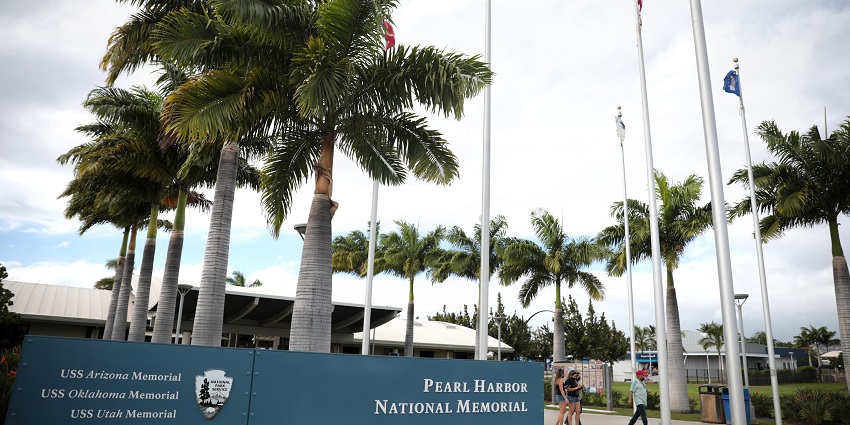 A group of people at the Pearl Harbour National Memorial entrance, Oahu, Hawaii. Viewers of this file can see comments and suggestions