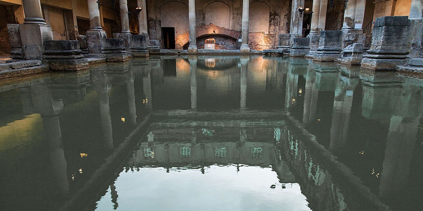 An image of the historic ruins of the Roman Baths in Baths, located in England.