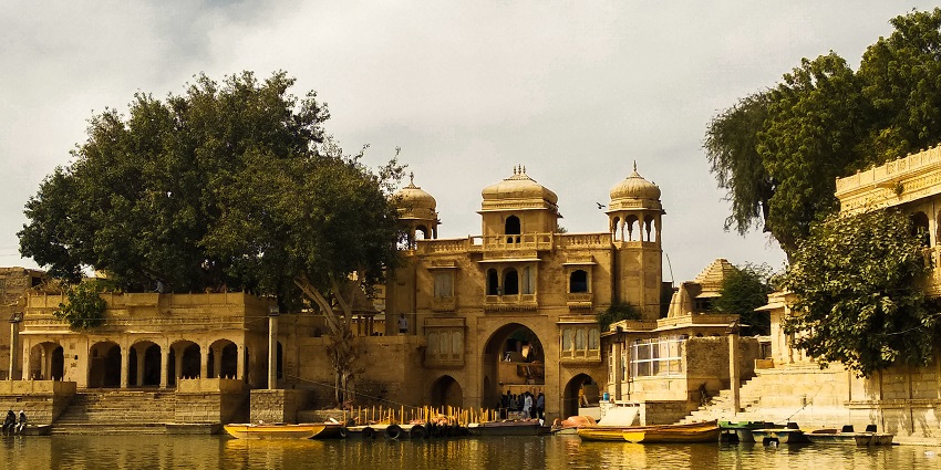 Gadi Sagar Lake, a scenic man-made lake surrounded by temples and historic structures.