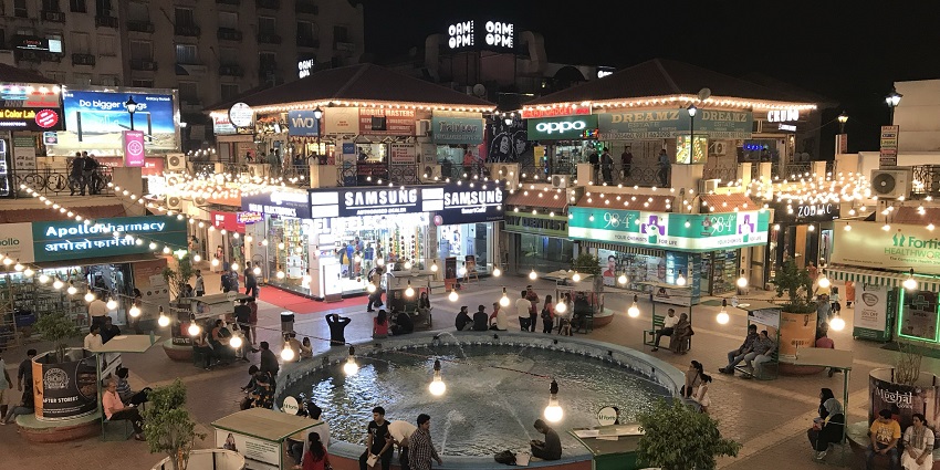 A beautiful view of DLF Galleria Market, a place to visit near De Adventure at night.