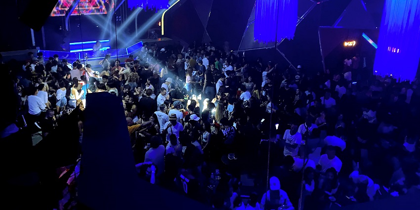 An image of the Gatsby nightclub, with elegant vintage decor and guests enjoying cocktails.