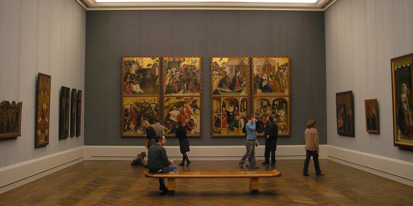  Inside the Berlin Gemaldegalerie with people viewing the Hans Multscher exhibit