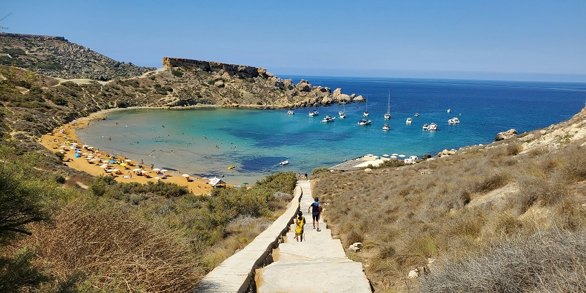 A stairway leading to beautiful Għajn Tuffieħa Beach in Northwest Malta, a stunning beach.
