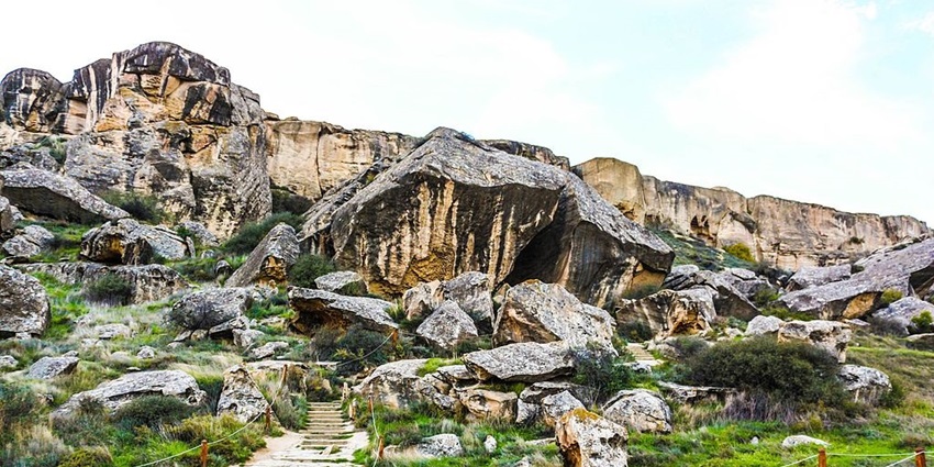 Historic site with ancient petroglyphs and mud volcanoes featured in Azerbaijan travel guide.