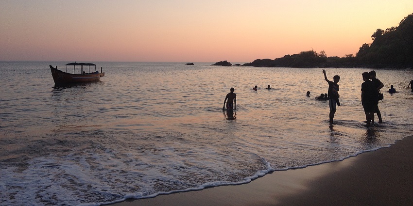 The tranquil beach is popular for relaxation and spirituality, as featured in the Gokarna tour guide.