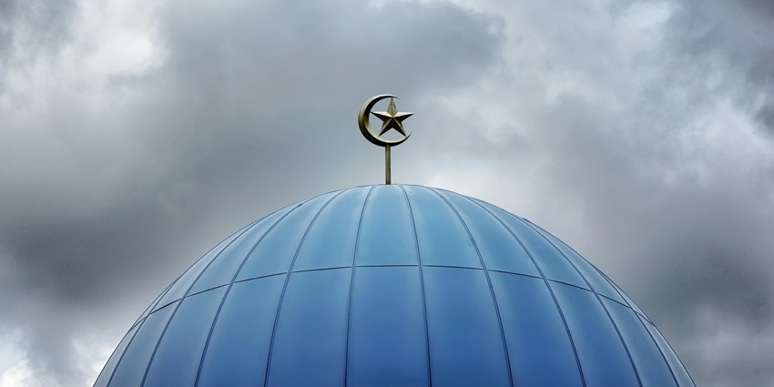 Interior of a mosque with a small minaret in the middle, among the mosques in Mauritius.