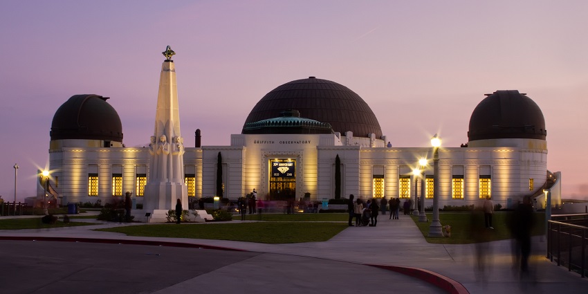 An image of Griffith Observatory with the Los Angeles skyline, a tourist attraction near the Getty Museum.