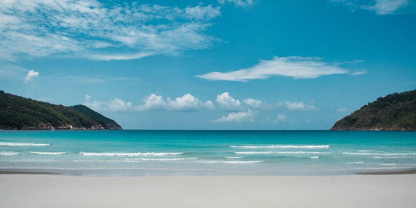 Guintacan Island offers serene landscapes, clear waters, and tranquil beauty.