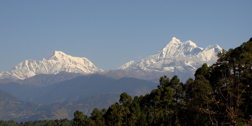 Expansive views of snow-capped mountains in Gwaldam.
