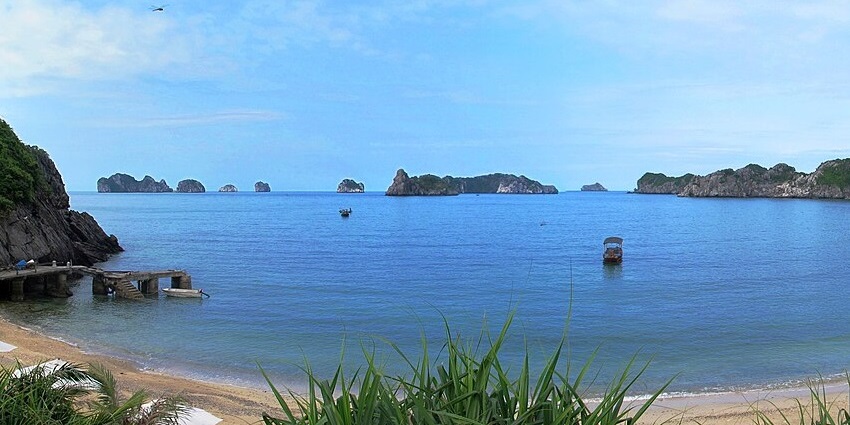 A wide view of Ha Long Bay facing the South China Sea from Monkey Island in Vietnam.