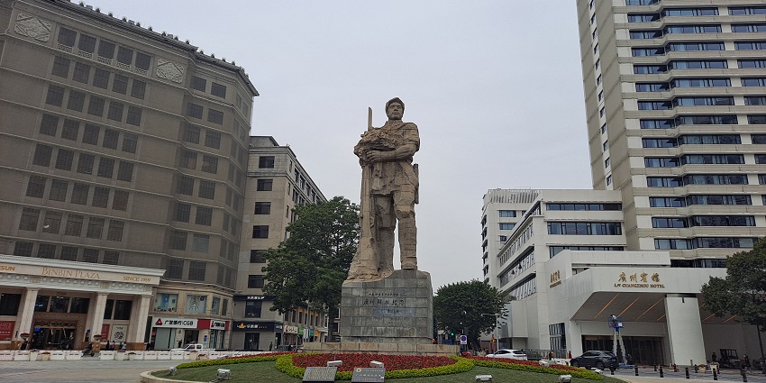 Image Haizhu Square during day time however at night its vibrant and people stroll around
