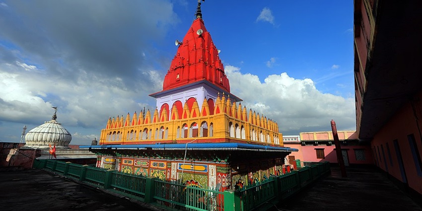 Image of Hanuman Garhi Temple, a major religious site under clear blue sky