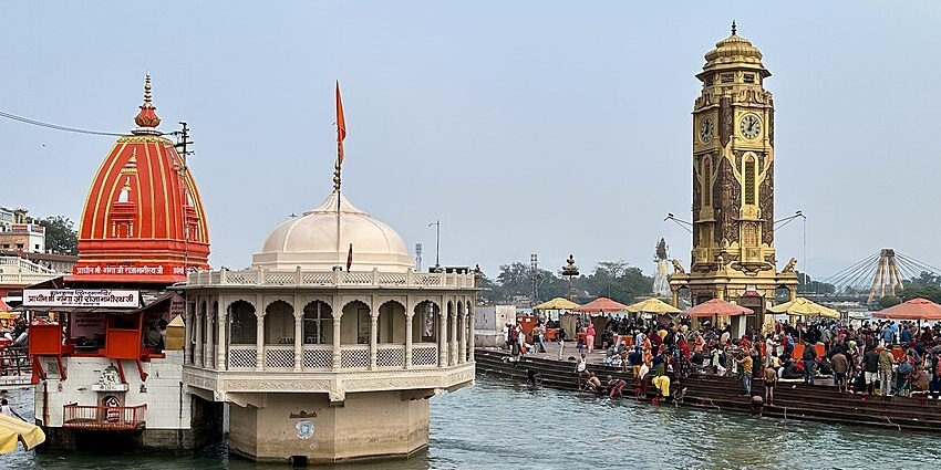 Image of Har Ki Pauri and Clock Tower of Haridwar near body of water