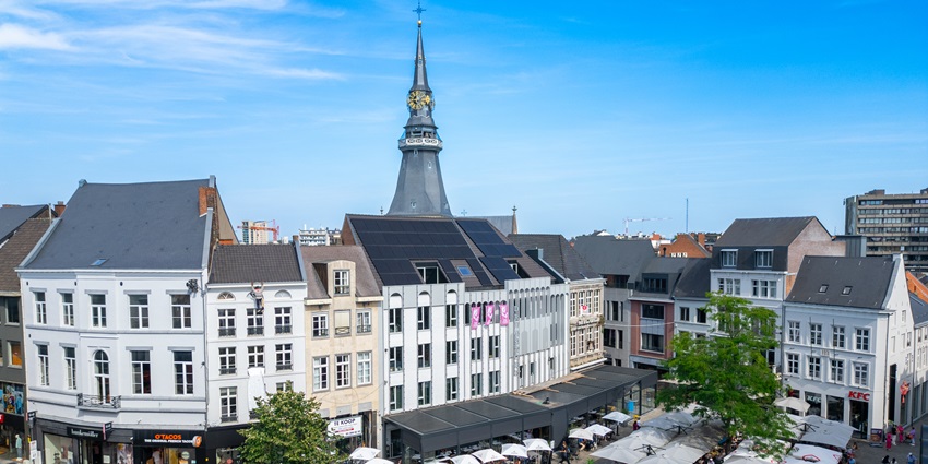 The modern streets of Hasselt are lined with shops - one of the places to visit in Belgium.